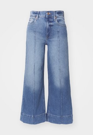 Vidde denim jeans i lyseblå, med høj talje, falmet design, forlommer og syede detaljer langs benene.