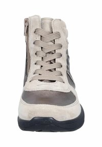 Beige suede high-top sneaker with brown leather accents, lace-up front, side zipper, and textured rubber sole. Flat, rounded toe design.