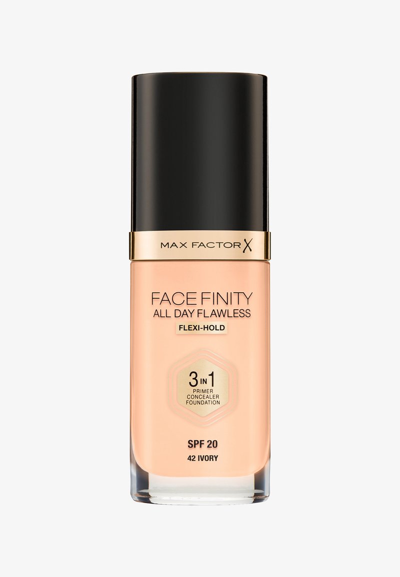 Max Factor Face Finity All Day Flawless foundation i en klar glasflaske med en sort låg. Cremerfarvet i elfenben, mærket med SPF 20.