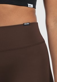 Smilodox SELINA HIGH WAIST YOGA SPORT - Leggings - braun