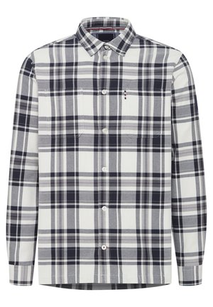 Pikend varrukatega plaidirõivas valgete, mereväe siniste ja halli toonide kombinatsioonis. Omab nupuga kraed, esist taskut ja nuppe nööbirea piki.