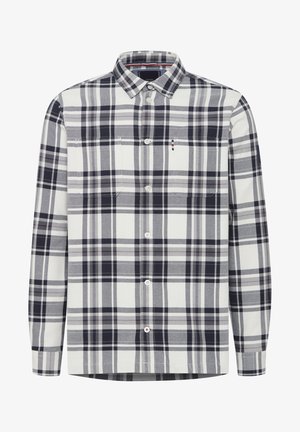 Langermet rutete skjorte i hvite, marineblå og grå nyanser. Har krage med knapper, brystlomme og knapper langs stolpen.