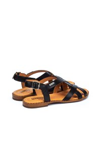 Zwarte leren sandalen met meerdere banden, open teenontwerp en verstelbare enkelgesp, voorzien van een tan gekussioneerde voetbed en kurken zool.