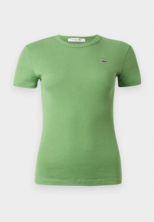 Camiseta verde canelada de algodão, com mangas curtas, decote redondo e pequeno logótipo bordado no peito.
