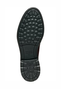 Suola della scarpa in gomma nera, con design testurizzato, dotata di impugnature circolari e fori di ventilazione. Contrassegnata con "GEOX ULTRA COMFORT" vicino al tallone.