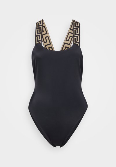 Üheosaline supluskleit musta kangaga, millel on laiad beežid rihmad geomeetrilise mustriga. Sile tekstuur ja keha järgi nišitav siluett.