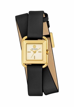 Gold square watch face with minimal markers and logo, paired with a long black leather wrap-around strap.