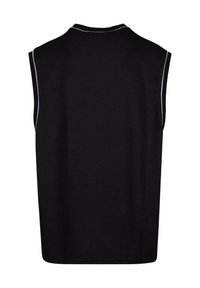 Top sans manches noir en tissu texturé, avec un accent blanc subtil le long du col et des épaules. Design classique et décontracté.