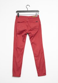 Rode slim-fit jeans van katoen, met achterzakken, gestikte details en een leren label op de tailleband.