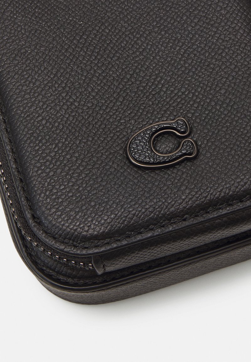 COACH PHONE CROSSBODY - Phone case - black - Zalando.ie