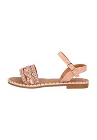 Sandali rosa con cuciture decorative e accenti di gemme, dotati di suola piatta e cinturino alla caviglia, realizzati in materiali sintetici.