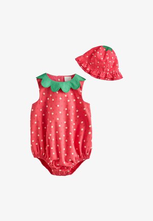Pelele rojo para bebé con lunares blancos y cuello ondulado verde, combinado con gorro a juego rojo con lunares blancos, ala fruncida y detalle de hoja verde.