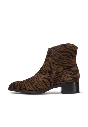 Brown suede ankle boot with a tiger stripe pattern, rounded toe, and low block heel. Smooth texture and no visible hardware or accents.