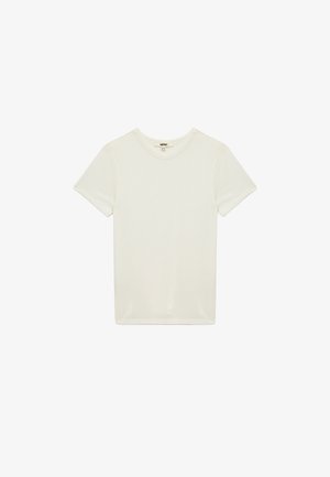 Valkoinen puuvillainen t-paita, jossa on pyöreä kaula-aukko ja lyhyet hihat. Paita on yksinkertainen ja sileä, sopii rentoon käyttöön.