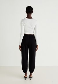 GAP BAGGY - Tepláky - true black