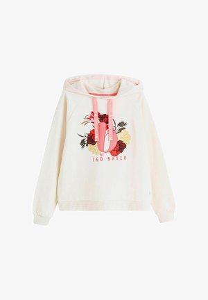 Crèmekleurige hoodie met roze aantrekkoorden, bloemrijke afbeelding in rood, geel en zwart, en de tekst "By Ted Baker" aan de voorkant.