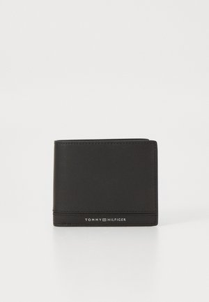 Black leather wallet with a sleek design, featuring stitching details and a visible brand logo at the bottom front. Compact and rectangular shape.