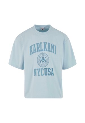 Light blue cotton t-shirt with short sleeves, featuring "KARLKANI" and "NYCUSA" printed in darker blue font and a circular graphic logo.