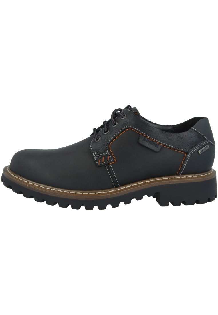 Chaussure en cuir noir avec des coutures orange contrastantes, semelle robuste et bout arrondi. Présente un design à lacets avec un empiècement texturé.