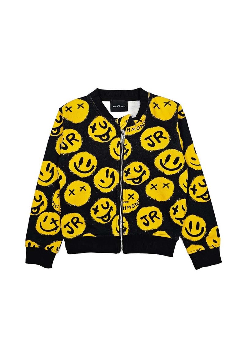 Giacca nera con zip decorata con un motivo di grandi facce sorridenti gialle e le lettere "JR." Polsini e collo a costine, texture morbida.