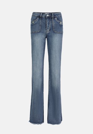 Flared jeans in medium blue denim, featuring two front pockets, subtle stitching, and a frayed hem. Classic five-pocket design.