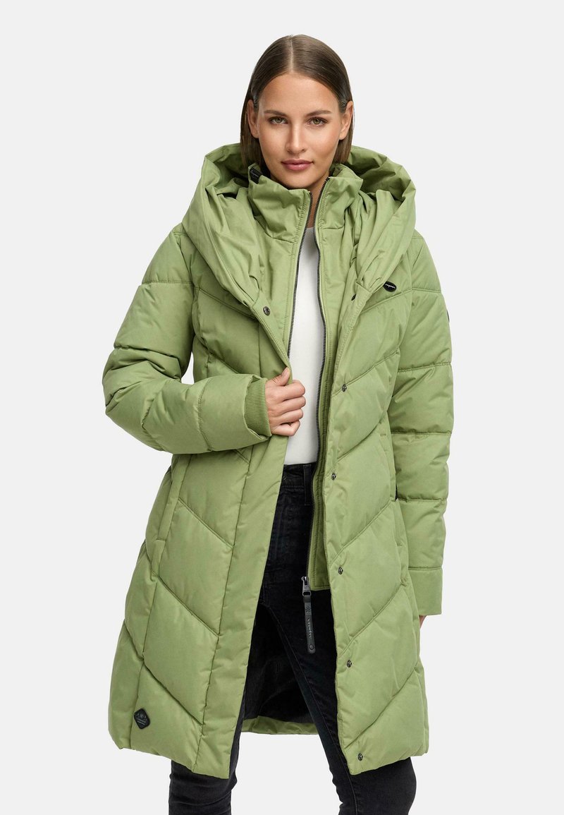 Light green padded coat with a large hood, featuring rectangular quilted sections, front zipper, and snap buttons. Black logo detail on hem.