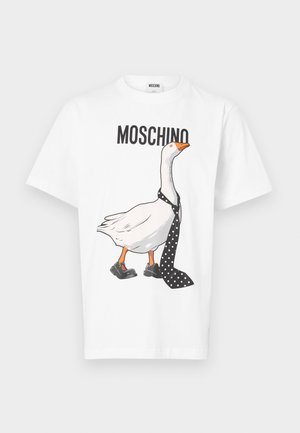 White cotton T-shirt featuring a cartoon duck wearing a polka dot tie and black shoes. "MOSCHINO" is printed above the illustration.