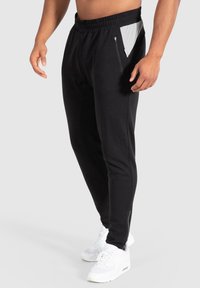 Smilodox MAISON - Træningsbukser - schwarz