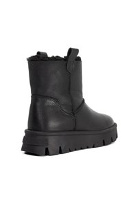 Black leather ankle boot with a textured finish and a chunky rubber sole. Features a fur lining and a loop at the back for easy wear.