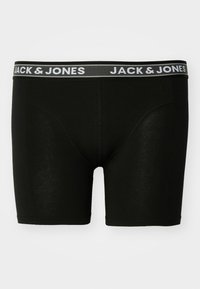 Boxer neri in tessuto liscio, con una cintura elastica grigia che riporta la scritta "JACK & JONES." Design aderente e cuciture a vista.