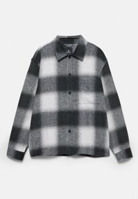 Cămașă în carouri alb-negru, cu închidere cu butoane, guler și mâneci lungi. Material moale cu un finisaj texturat și mai multe modele de carouri.