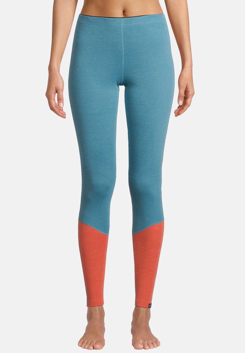 Legginsy w kolorze niebieskim i koralowym, charakteryzujące się dopasowanym krojem, kontrastowymi blokami kolorów, miękką teksturą oraz bezszwowym pasem.
