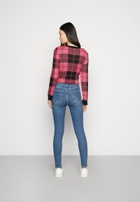 Dr.Denim MOXY - Calças de ganga de corte skinny - cape mid blue