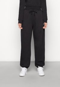Nike Sportswear - W NSW CLUB FLC MR PANT OS - Treniņtērpa apakšdaļas - black Miniatūras attēls 1