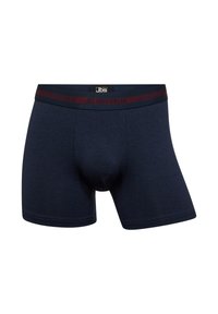 Mørkeblå herreboxer med blødt stof, der har et elastisk bælte med røde striber og "JBS UNDERWEAR" logo samt en kontureret pungen design.
