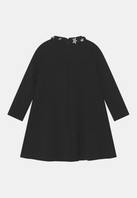 Abito A-line nero a maniche lunghe con zip sul retro e colletto decorato con applicazioni a forma di stella in argento.