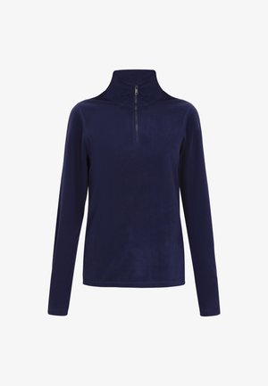 Mornarska flis majica s visokim ovratnikom i četvrtastim patentnim zatvaračem. Dugi rukavi, meka tekstura i glatka tkanina bez uzoraka ili dekoracija.