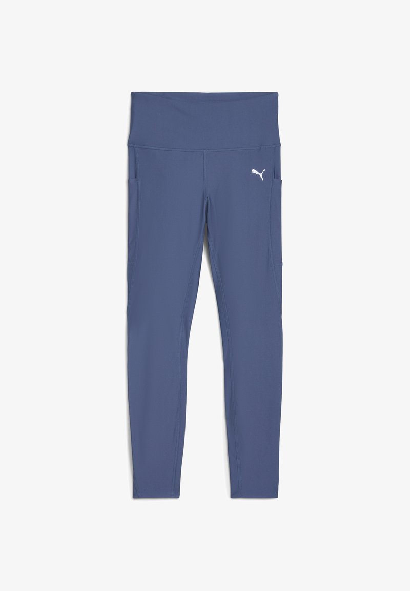 Marinblå leggings med bred midja, gjorda av elastisk tyg. Har sidofickor och en liten vit logotyp nära midjan.