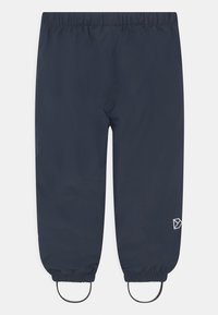 Námořnické voděodolné kalhoty s elastickým pasem, elastickými manžetami a dvěma bočními smyčkami. Na dolní části nohy se nachází bílé geometrické logo.