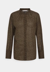 Langsleeve shirt in bruine stof met een zwart luipaardprintpatroon. Heeft een hoge kraag en gathered details bij de halslijn.