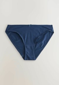 Culotte bikini en coton bleu marine pour femme, avec un petit nœud sur le devant au centre, posée à plat sur un fond clair.