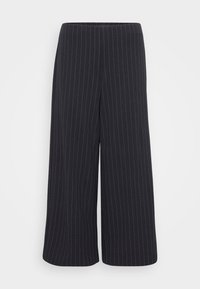 Schwarze weit geschnittene Hosen mit weißem Streifenmuster. Hergestellt aus glattem Stoff, mit hoher Taille und ohne sichtbare Verschlüsse.