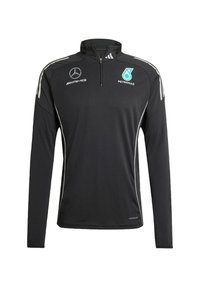 Maglietta Ufficiale Mercedes AMG Petronas F1 2024 Donna – Stampa Esagonale Tono Su Tono, Loghi Team E Sponsor, Girocollo – La Replica Ufficiale Per Le Tue Giornate Da Fan
