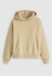 Felpa beige con cappuccio realizzata in materiale morbido, dotata di una tasca a marsupio frontale, polsini e orlo a costine. Texture liscia con dettagli minimi.