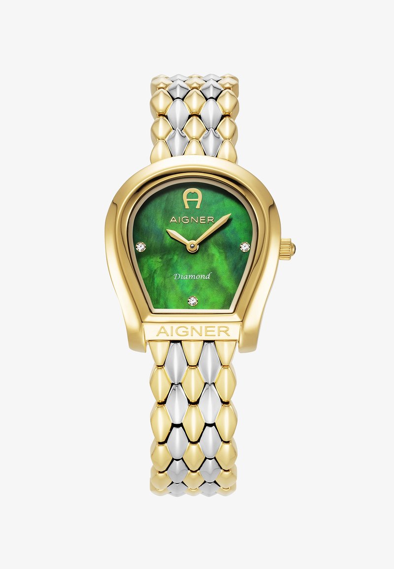 Zelta un sudraba metāla pulkstenis ar zaļu ciparnīcu, kurā ir dimanta akcenti, ovāla forma un rakstaina siksna ar maiņojošām krāsām.