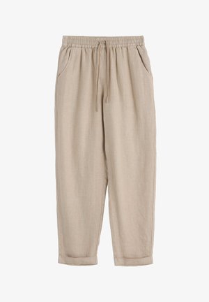 Pantalones de lino beige con cintura elástica, detalle de cordón, bolsillos laterales y puños doblados, que cuentan con una textura suave y ligera.