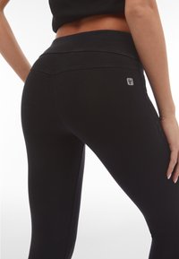 Freddy Leggings - jeans nero-cuciture in tono