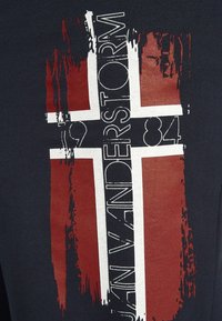 Jan Vanderstorm VEGAR - Tracksuit bottoms - dunkelblau