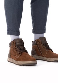 Rieker Botines con cordones - braun