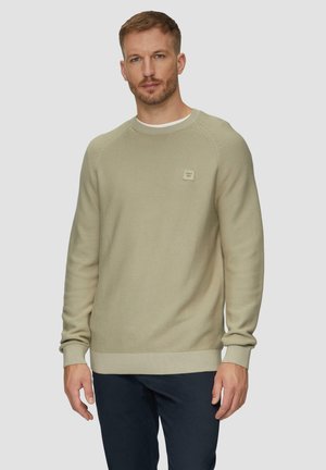 Light green knitted sweater with ribbed hem and cuffs, featuring a small logo patch on the chest, round neckline, and textured fabric.